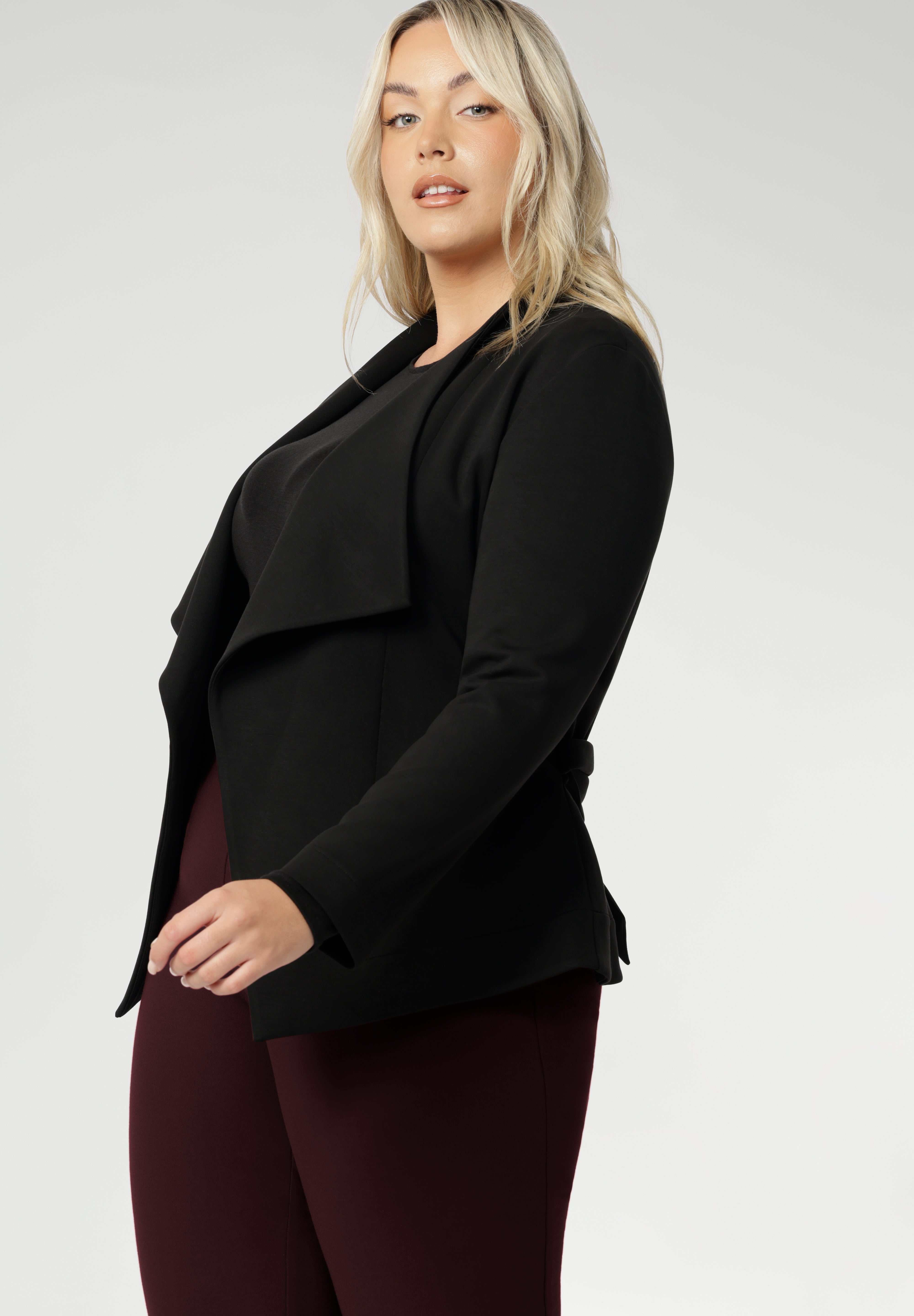 The Lyndon Jacket in Black is your perfect match. Crafted from our luxe Modal fabric, this piece offers a soft stretch and elegant drape that moves with you effortlessly. Available in size 8-24.