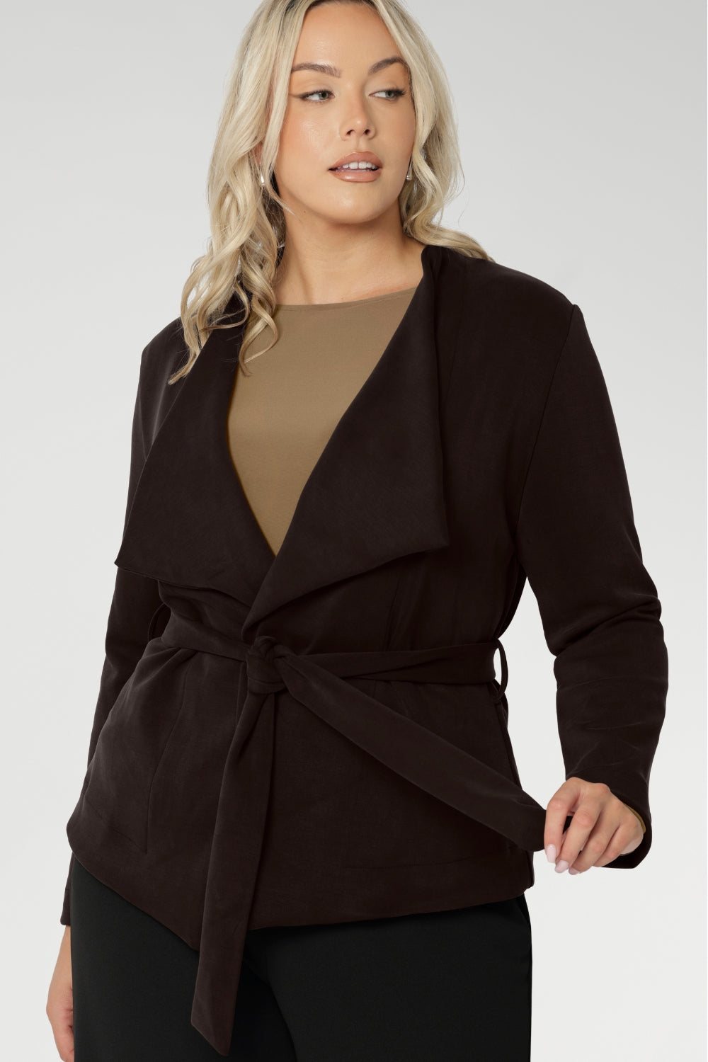 The Lyndon Jacket is a stylish and sophisticated women's winter jacket, proudly Australian made and thoughtfully designed for modern versatility. Crafted from a luxe Modal stretch fabric, this easy-care piece offers both warmth and elegance—perfect for layering during the cooler months.