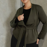 Lyndon features a double-layer jacket with   angled front panels for a modern edge and a detachable waist tie with belt loops, allowing you to wear it open or cinched to define your silhouette.