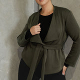 Lyndon features a double-layer jacket with angled front panels for a modern edge and a detachable waist tie with belt loops, allowing you to wear it open or cinched to define your silhouette.