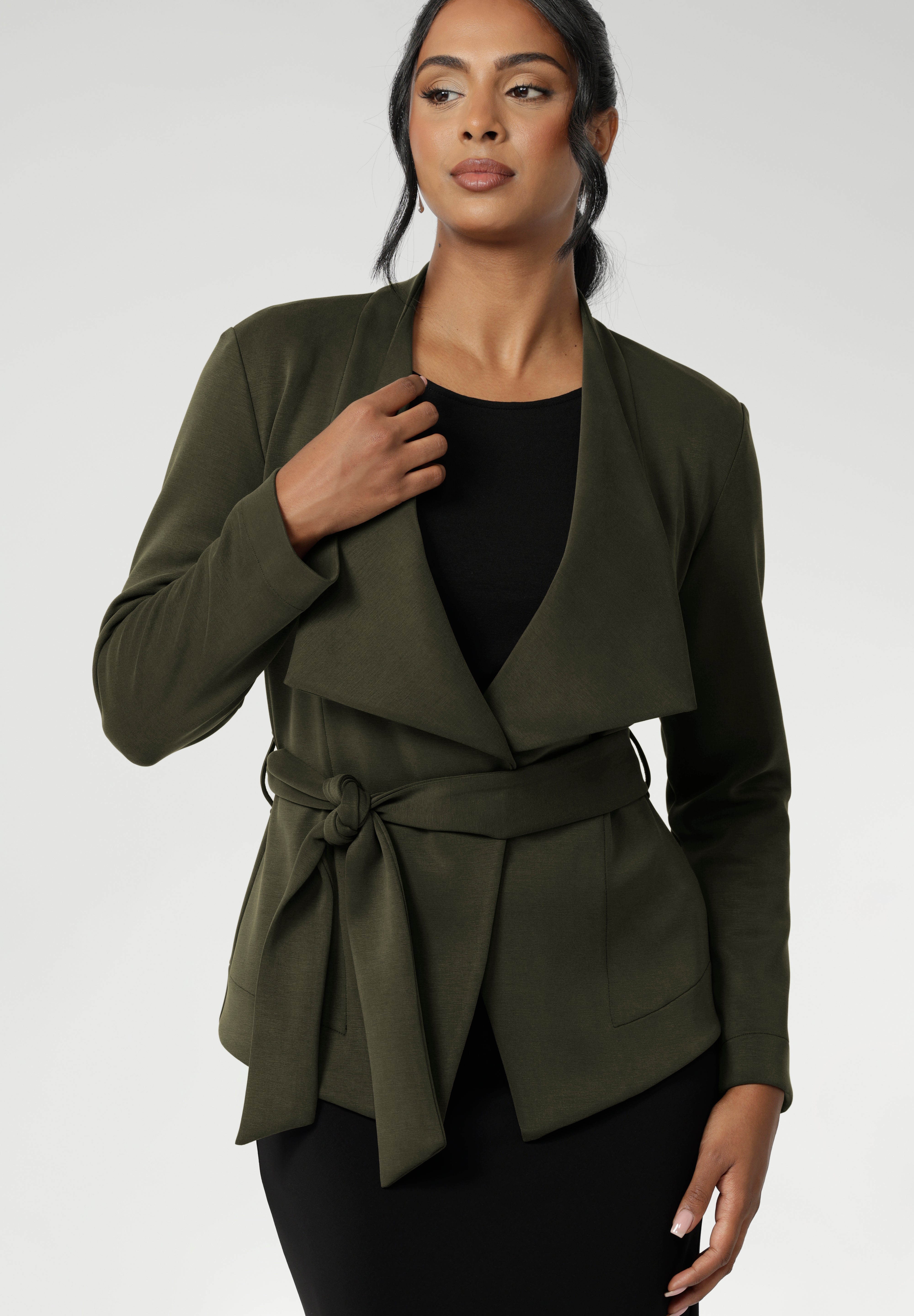 Designed with both comfort and sophistication in mind, Lyndon features a flattering wrap silhouette that can be worn open for a relaxed look or cinched at the waist with its coordinating tie for a more defined shape.