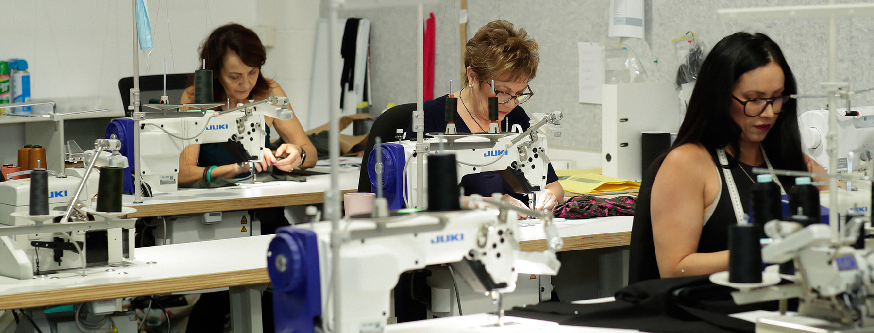 Picture from inside Australian-made women's clothing label, L&F's Queensland based design studio where garments are cut and sewn by local machinists.