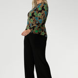 The long sleeves provide added warmth, while the straight hemline at the front and curved hemline at the back, which sits longer, give it a modern touch.