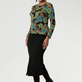 The long sleeves provide added warmth, while the straight hemline at the front and curved hemline at the back, which sits longer, give it a modern touch. Available in sizes 8-24, this top is Australian Made, ensuring quality and craftsmanship. It’s a versatile piece that will effortlessly elevate your everyday wardrobe.