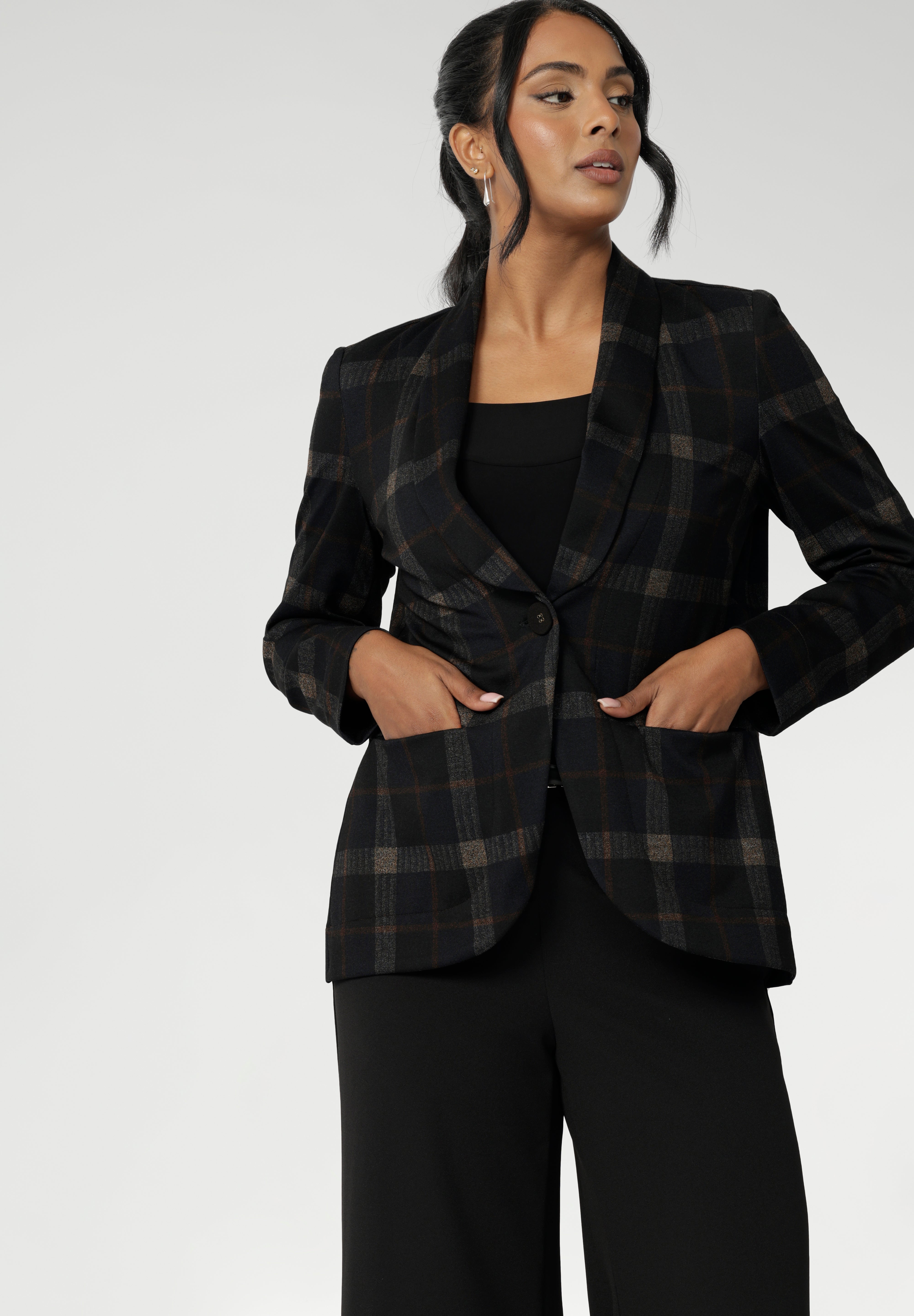 Whether worn as a full suit or styled individually, this collection delivers elevated style with the ease of ponte fabric will have you ready to carry you confidently from desk to dinner.