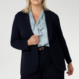 The Michael Shirt in Ice Blue is the perfect blend of modern elegance and workwear chic designed to effortlessly transition from workwear to evening style. This powder blue blouse has flutter sleeves and neck ties that can be tied up with a bow or left undone for a relaxed tuxedo look. Available in size 8-24.