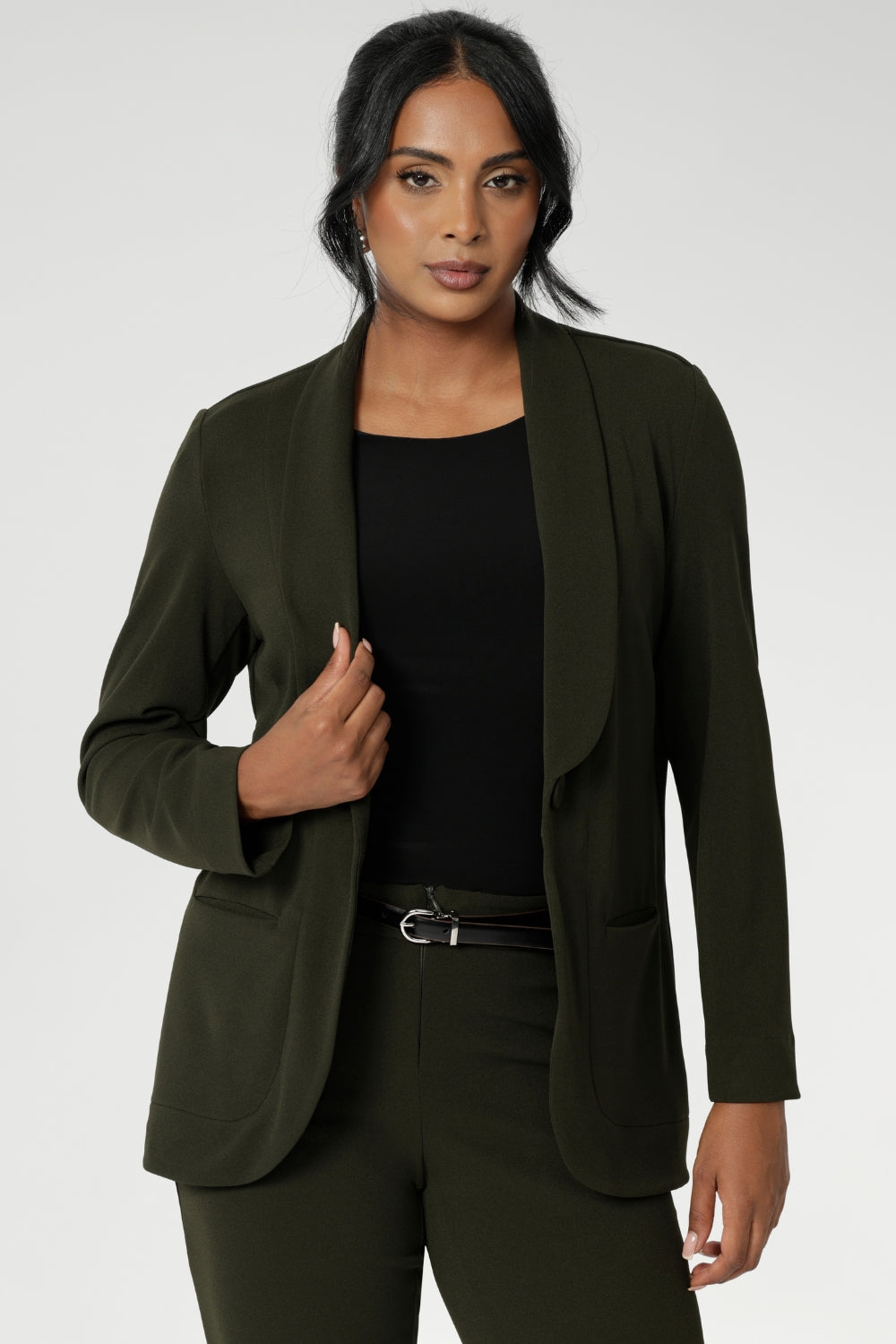 Olive Merit blazer made from Scuba crepe, easy care fabric. With functional patch pockets and tailored shawl collar, you will look stylish in all corporate and casual occasions. Woman's workwear clothing made in Australia sizes 8 - 24.