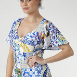 The Mica Maxi Dress in Mosaic Tile captures the beauty of Mediterranean design with its Sicilian-inspired print in vivid hues of cobalt, yellow, brown, and green. Made from our signature soft-touch stretch jersey with a luxurious satin feel, this Australian-made maxi dress drapes effortlessly over the body.