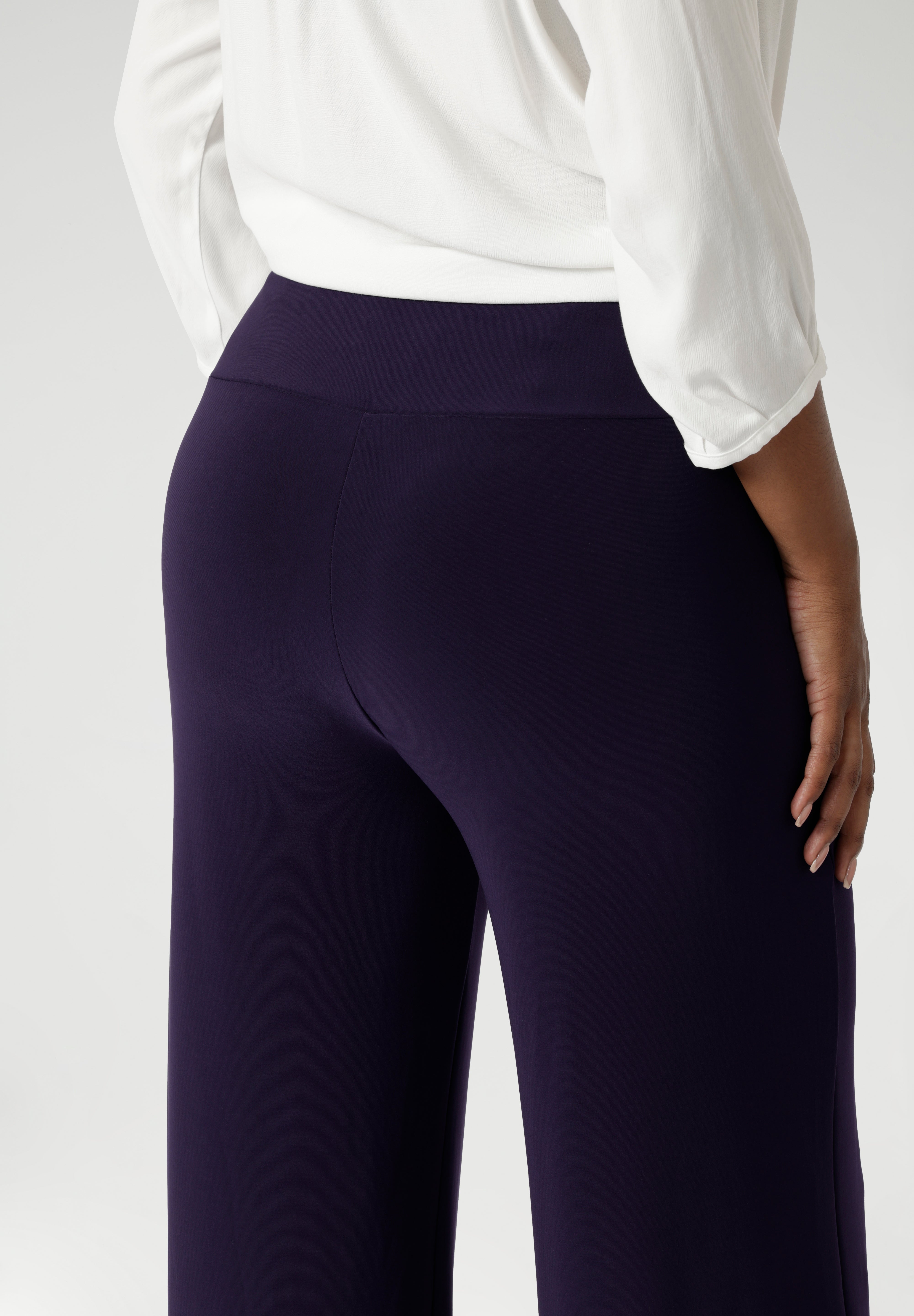 The deep, double-layer waistband offers a smooth and flattering silhouette, while the side pockets with topstitching detail provide both functionality and a stylish touch. The straight leg cut is timeless and professional, offering a sleek, streamlined appearance that complements a wide range of outfits. Available in 3 lengths and in sizes 8-24.