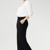 The Monroe Pant is a wardrobe essential for women who value style and comfort. Made from our soft, draping luxe jersey, it features a pull-on design, double-layer waistband, side pockets, and straight-leg silhouette. Available in three lengths and sizes 8-24, it pairs seamlessly with our fluid-suiting collection. Proudly Australian made.