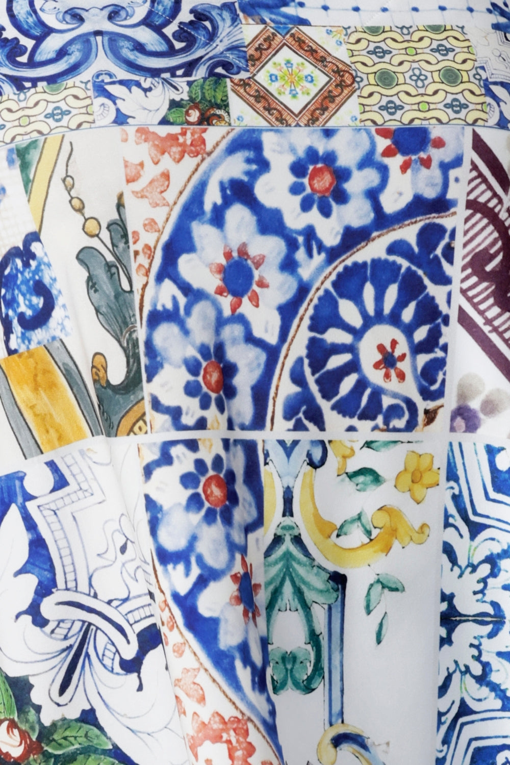 Still swatch image of Mosaic Tile print. Made from our soft-touch jersey fabric with gentle stretch and a satin-like feel, this Australian-made culotte showcases a captivating Sicilian-inspired print in cobalt, yellow, brown, and green. Used to create a collection of womens holiday collection in sizes 8-24.