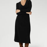 A flattering V-neckline, subtle gathering through the front and back, and shelf lining at the bust create a polished yet comfortable fit. Finishing just below the knee, the Nadine Dress is effortlessly elegant on its own or layered as the seasons change. Available in sizes 8–24.