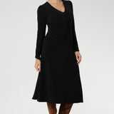The Nadine Dress is a sophisticated staple, proudly designed and made in Australia from our signature black dry-touch stretch jersey. This timeless piece features a soft A-line silhouette that enhances the figure, while ruched sleeves add a modern, fashion-forward detail.
