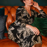 The Nadine Dress is a refined statement piece, expertly crafted in Australia from our signature black dry-touch stretch jersey for a smooth, flattering fit.