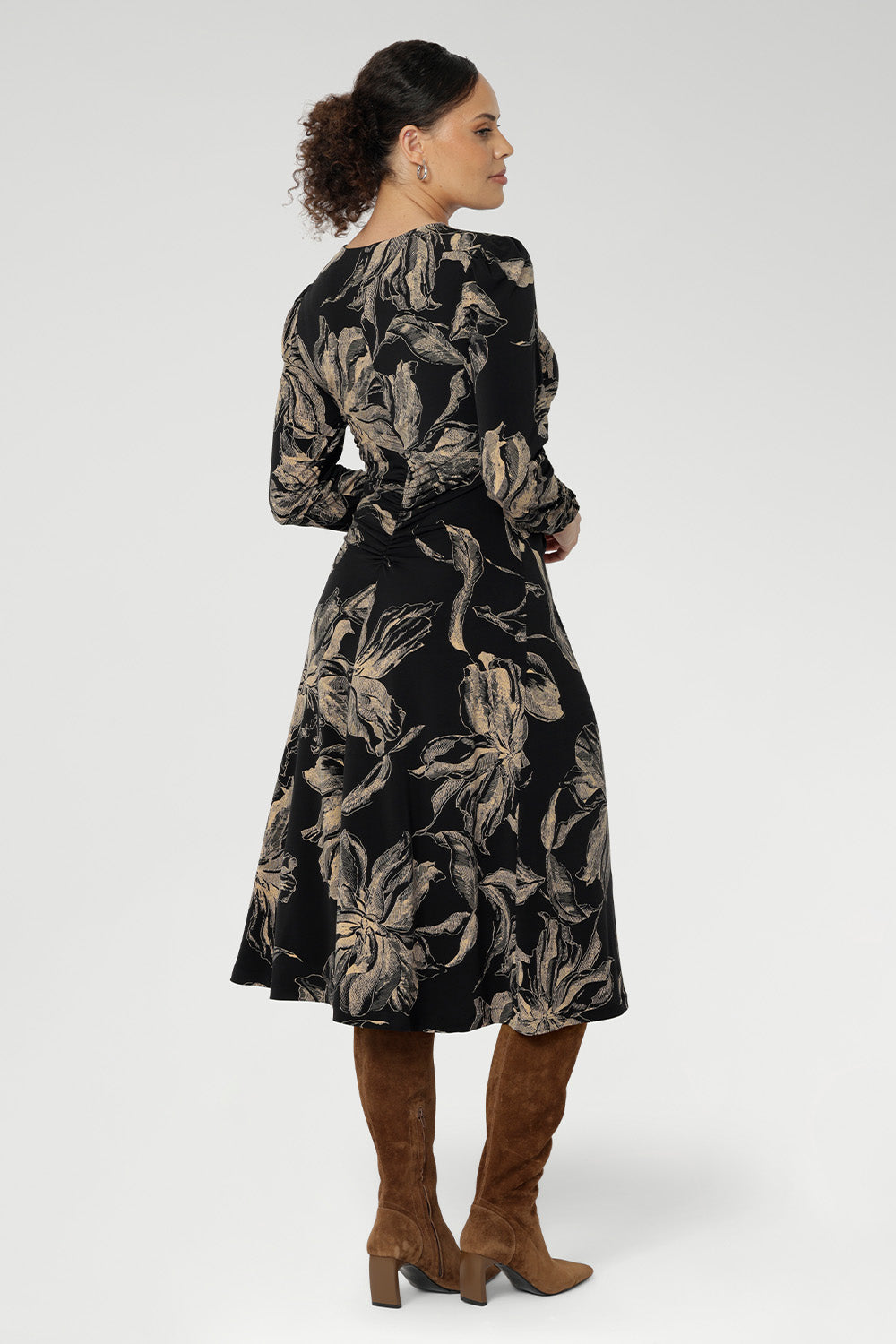 The Nadine Dress is a refined statement piece, expertly crafted in Australia from our signature black dry-touch stretch jersey for a smooth, flattering fit.