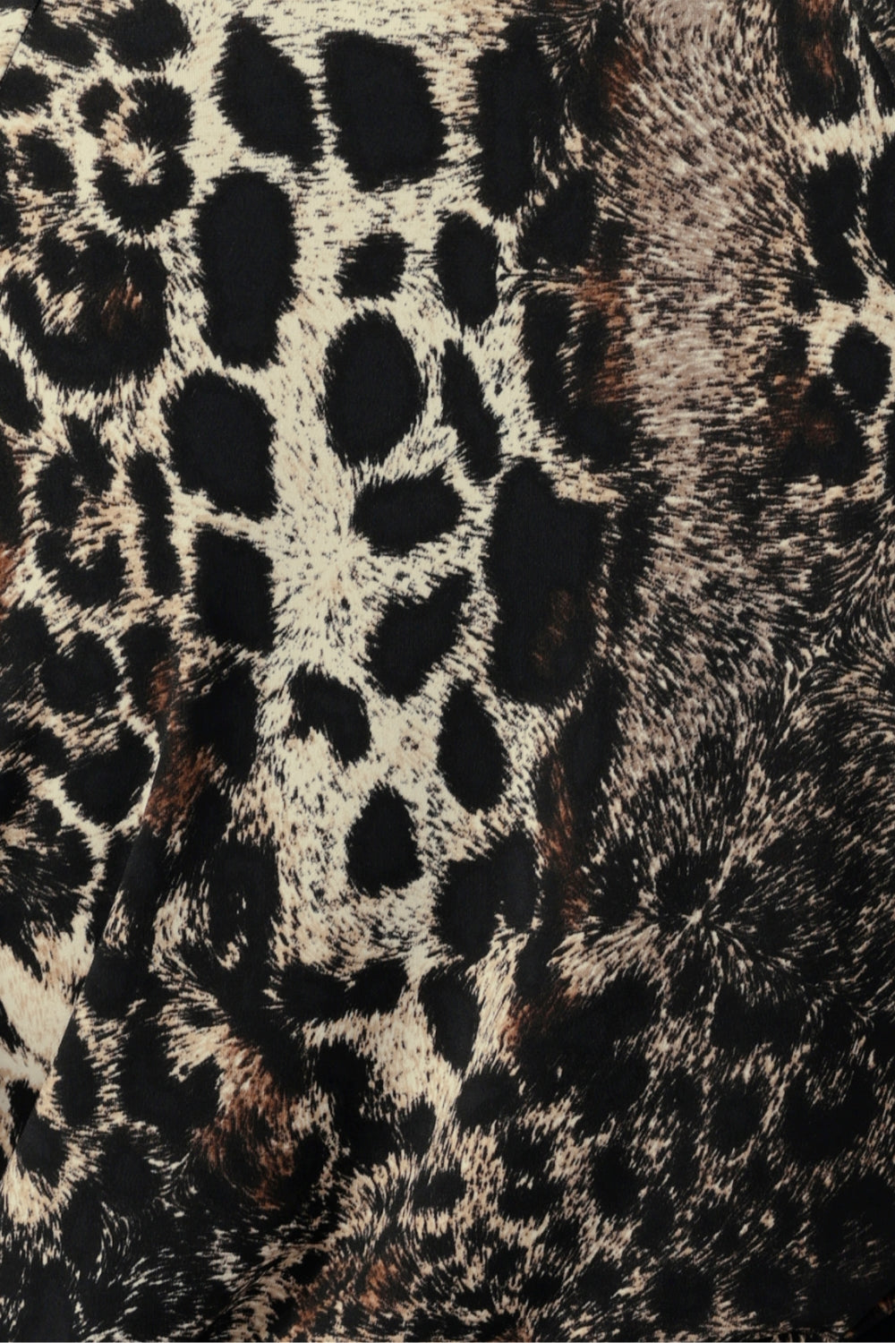 Panthera print is on a dry-touch jersey base with print details in black, cream and brown shades. The Fabric has soft stretch. Used by women's clothing brand Leina & Fleur to create a collection of tops, pants and skirts for Australian women in sizes 8-24.