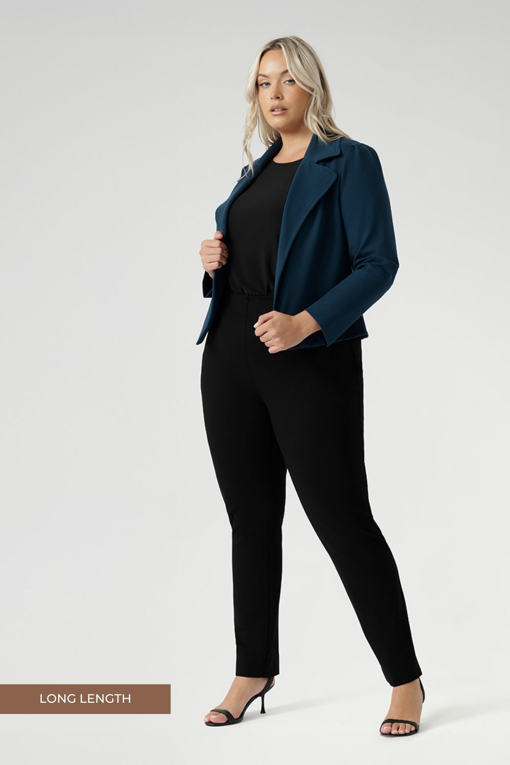 Plus size woman wears the Paxton Pant in the black long length, with matching black workwear top and the Garcia Jacket in petrol for a full suiting look and pop of colour. Paxton is a pull-on style designed for the woman on the go. It effortlessly pairs with L&F separates and the Garcia jackets, creating a comfortable and stylish suiting look. Proudly made in Australia size 8-24.