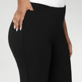 A size 10 woman wears the Paxton Pant in black. A firm fitting ponte pant in black. A slack pant with cropped length. Made in Australia for women size 8-24.