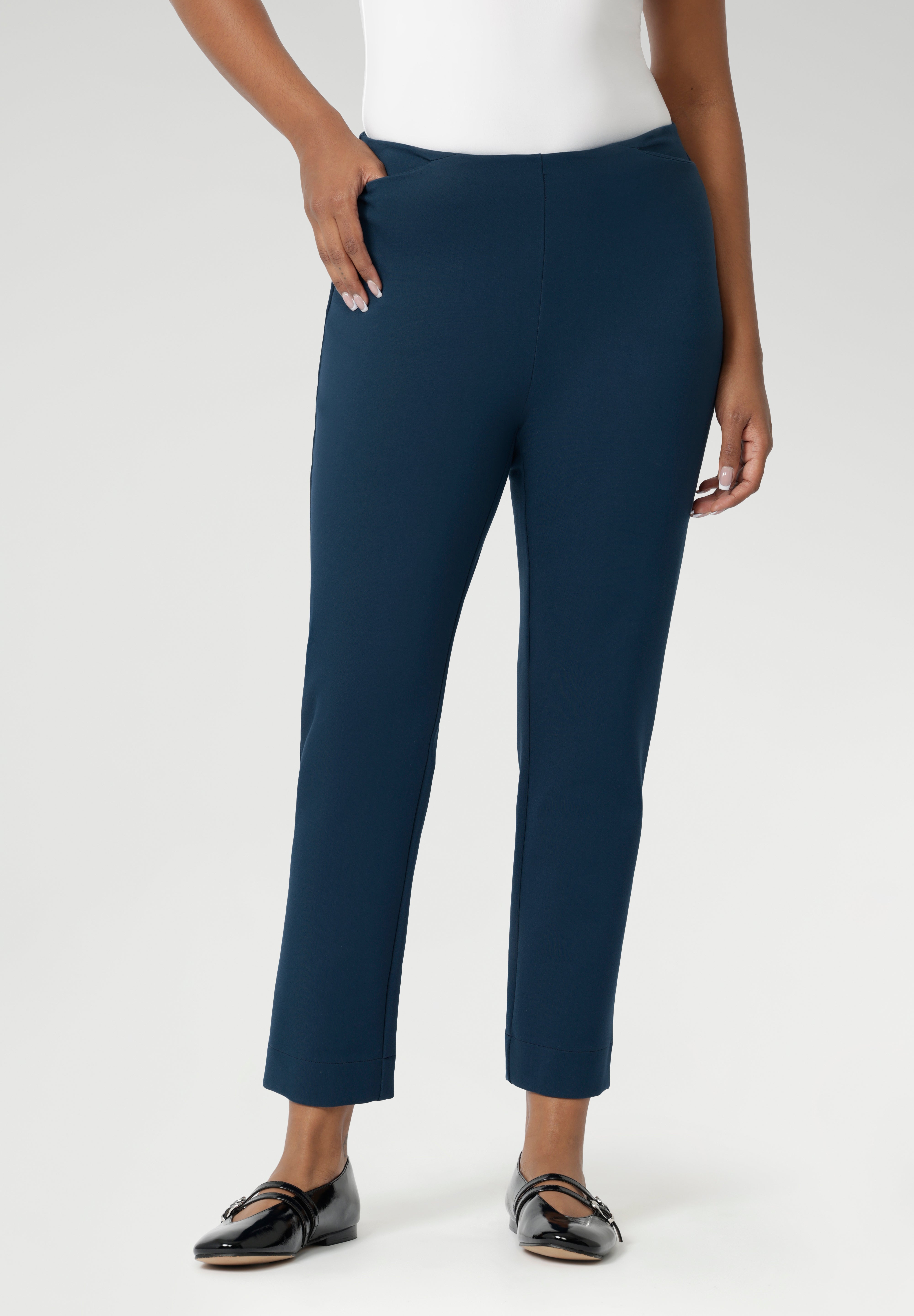 The Paxton Pant is on a dry-touch Ponte jersey base. The fabric has firm stretch. Pull on style pant features a straight leg cut, high pockets and ankle slit details. Available in 3 lengths in sizes 8-24.
