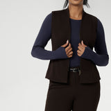 It also includes back side panels for a tailored fit and is available in sizes 8-24. Proudly made in Australia, this vest is a must-have for those seeking both style and comfort. Size 10 model wears double ended zip vest over tencel wool winter top.