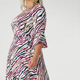 Gathered detailing at the sleeve heads adds a sophisticated touch to the overall design. The midi-length A-line skirt is both flattering and functional, complete with convenient side pockets for added practicality.