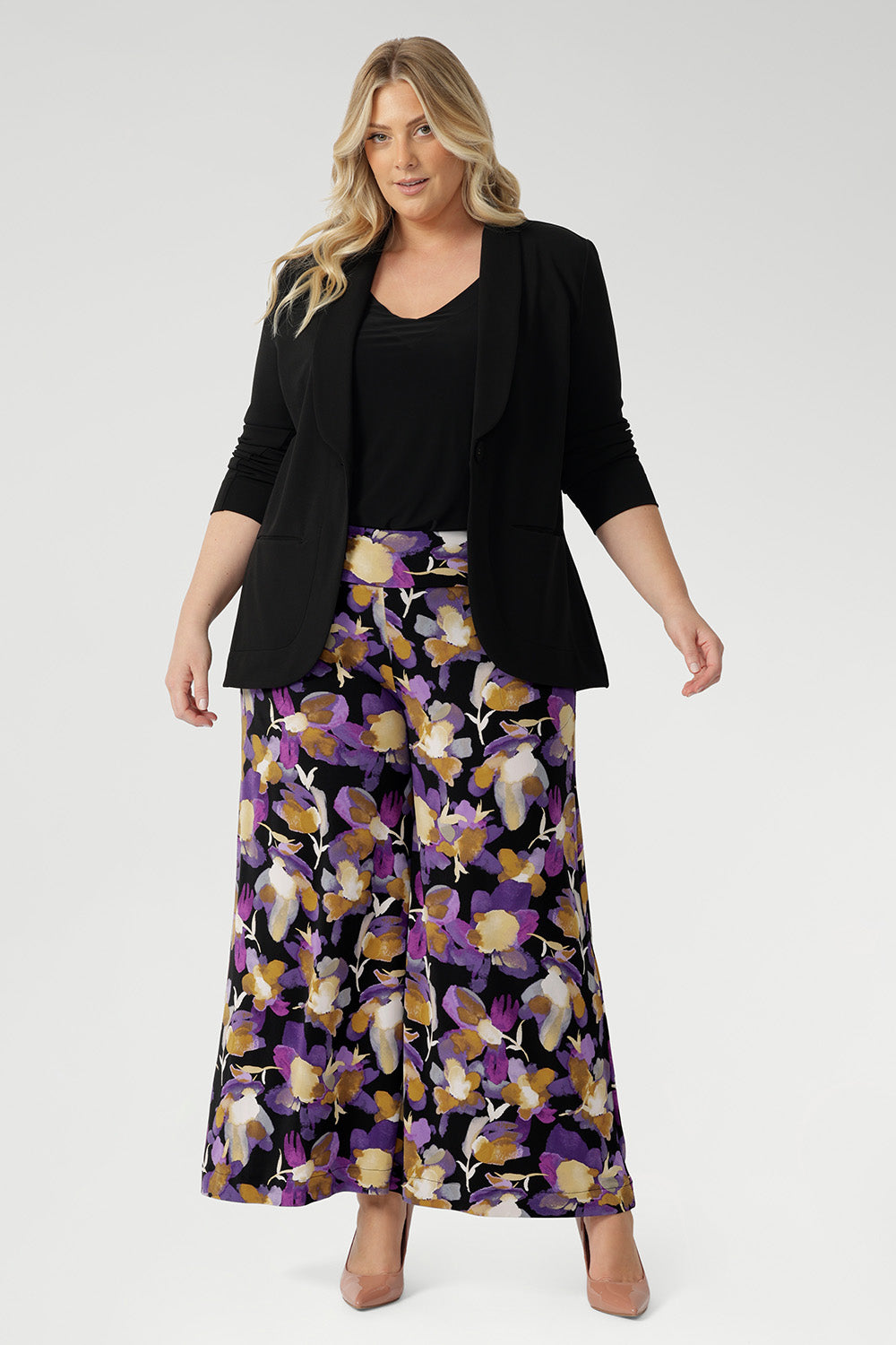 Make a bold style statement with the Presley Pant—a striking blend of comfort, drama, and effortless sophistication. Crafted from our signature dry-touch stretch jersey, these full-length pants feature an extreme flare leg that brings runway-worthy movement to your everyday or event-ready wardrobe.