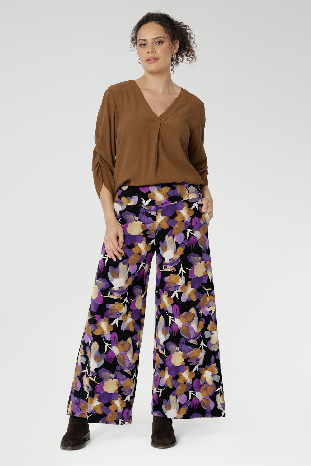 Crafted from our signature dry-touch stretch jersey, these full-length pants feature an extreme flare leg that brings runway-worthy movement to your everyday or event-ready wardrobe. Designed with a pull-on style and a supportive double-layer waistband, the Presley Pant offers a flattering fit with all-day comfort.