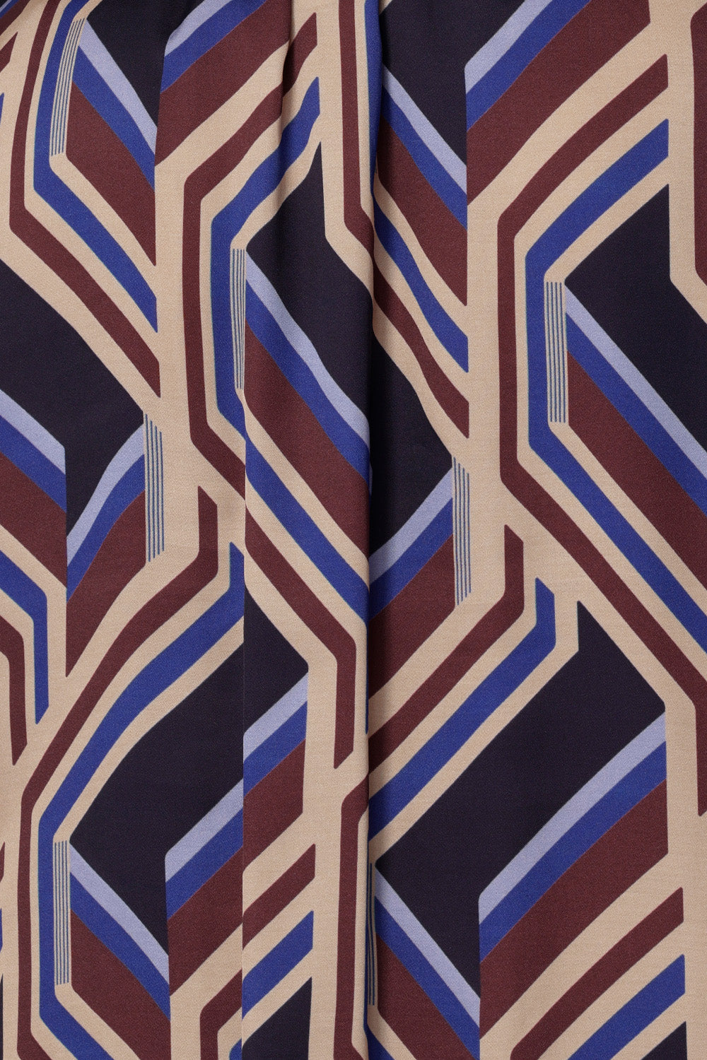 Showcasing a bold geometric striped print fabric used to create a women's swing shirt. By Leina + Fleur in sizes 8-24. Made in Australia. Plus size friednly & petite height friendly womens clothing.