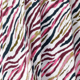 Close up image of Rainbow Zebra print used by Australian clothing brand Leina & Fleur to create a collection of workwear shirts and dresses. Crafted on Australia Made dry touch jersey fabric that has soft stretch and provides full body comfort.