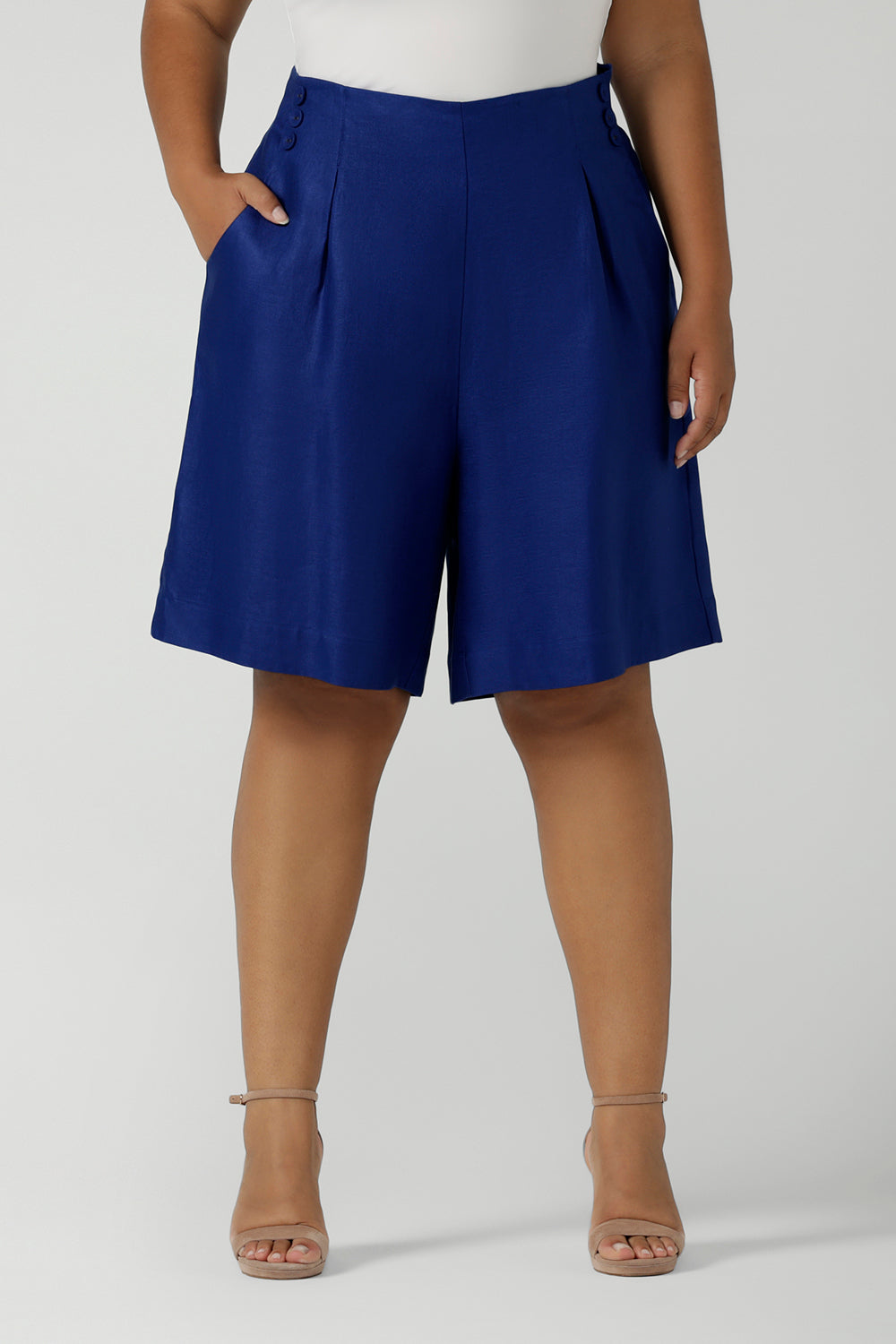 Close up of a size 12 women wearing the Houston Blazer in Cobalt linen size 12. Styled back with a matching Cobalt Linen Blazer with a button front and patch pockets. Made in Australia for women size 8 to 24.