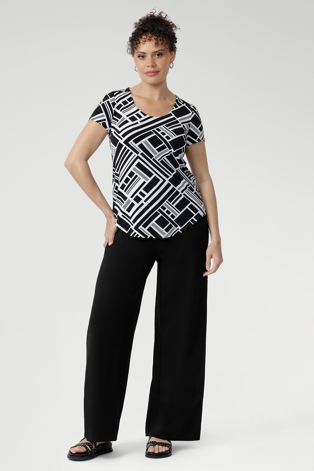 The Sawyer Top is a wardrobe essential that transitions seamlessly from smart workwear to casual weekend looks. Lightweight, wrinkle-resistant, and easy to pack, it’s an ideal travel piece for women who value both style and practicality.