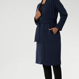 The buggy lining at the back ensures added comfort, while the waist seam at the back provides a flattering shape. With belt loops and a fabric waist tie, this versatile trench coat is available in sizes 8-24 and is proudly made in Australia.