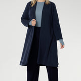 The Sorel Trench Coat is expertly tailored with a modern, sophisticated silhouette that elevates any wardrobe. Crafted from a luxurious winter-weight Modal fabric, it combines soft structure and stretch, making it the perfect travel companion for those seeking both style and comfort.
