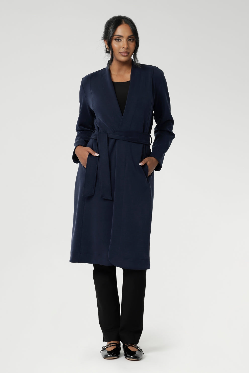 The buggy lining at the back ensures added comfort, while the waist seam at the back provides a flattering shape. With belt loops and a fabric waist tie, this versatile trench coat is available in sizes 8-24 and is proudly made in Australia.