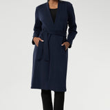 The buggy lining at the back ensures added comfort, while the waist seam at the back provides a flattering shape. With belt loops and a fabric waist tie, this versatile trench coat is available in sizes 8-24 and is proudly made in Australia.