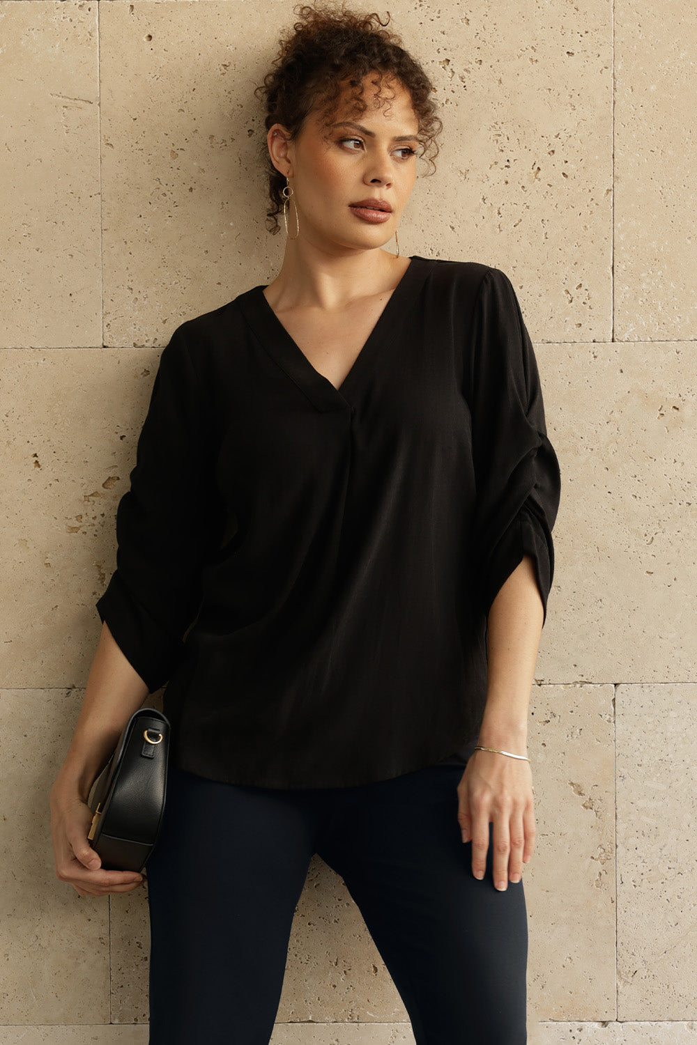 The Terry Shirt in Graphite is a refined and versatile workwear piece that blends timeless style with thoughtful design. Made from a soft, breathable Tencel Viscose fabric, it boasts a sand-washed texture that feels luxurious against the skin and drapes beautifully, offering a flattering silhouette.