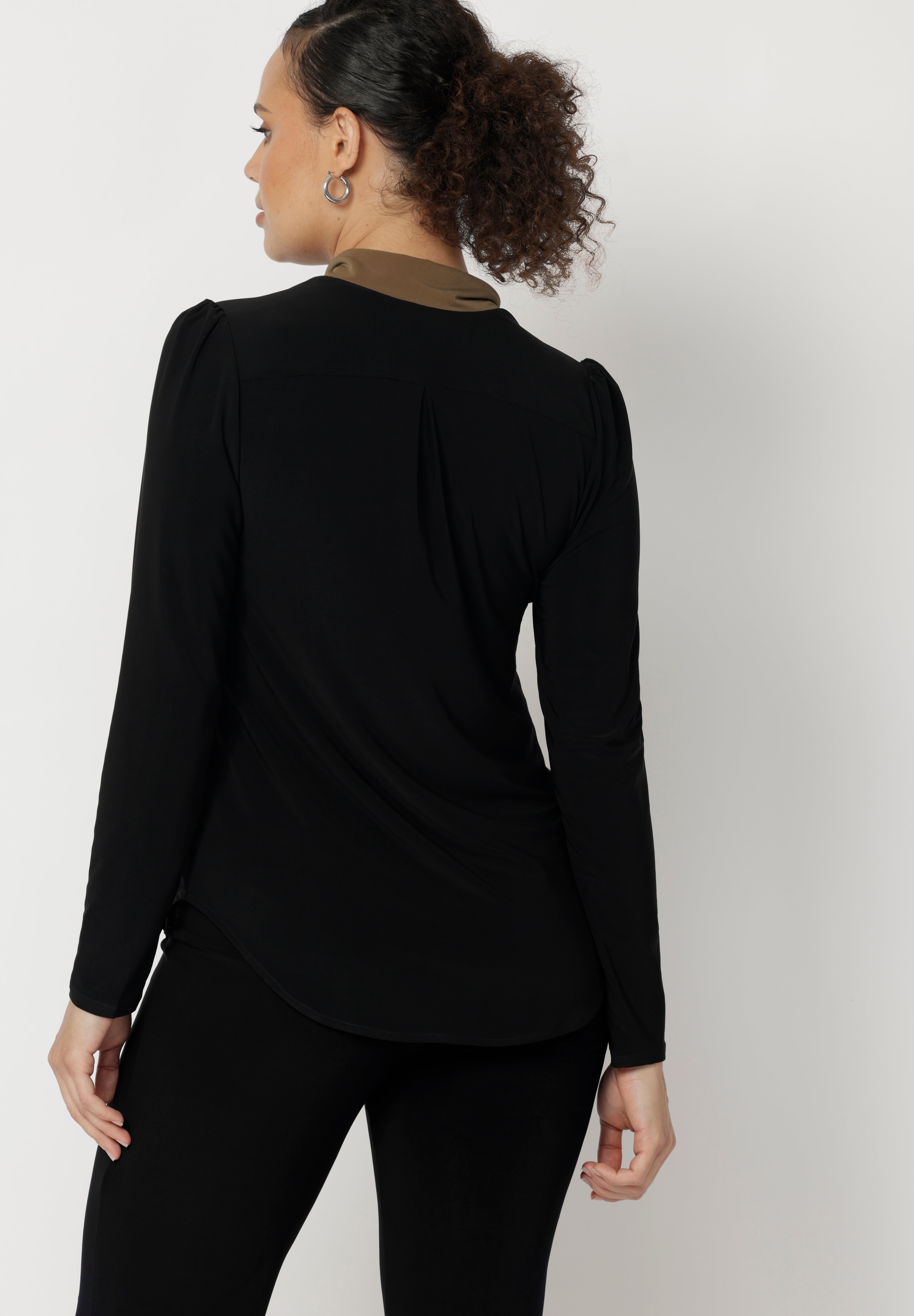 Crafted from our signature dry touch, wrinkle-resistant jersey fabric, the Thom Top is as practical as it is stylish, with an easy care finish that makes it perfect for regular wear. The V-neckline is enhanced by the attached ties, while gathered detailing at the shoulders and a tailored back tuck through the shoulder yoke bring gentle structure and shape.