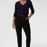 Made in Australia by Australian and New Zealand women's clothes brand, Leina & Fleur. A V-neck top with 3/4 sleeves on a purple jersey base that is easy-care and a wardrobe go to. Wear this top with workwear separates as an office top or dress down with casual pants as a comfortable top for the weekend.