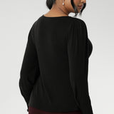 Zara is designed to seamlessly transition from office to off-duty. Whether layered under the structured softness of an LF Garcia jacket or paired with the sleek lines of a Sorel Trenchcoat, it’s the go-to knit top for effortless autumn and winter style.