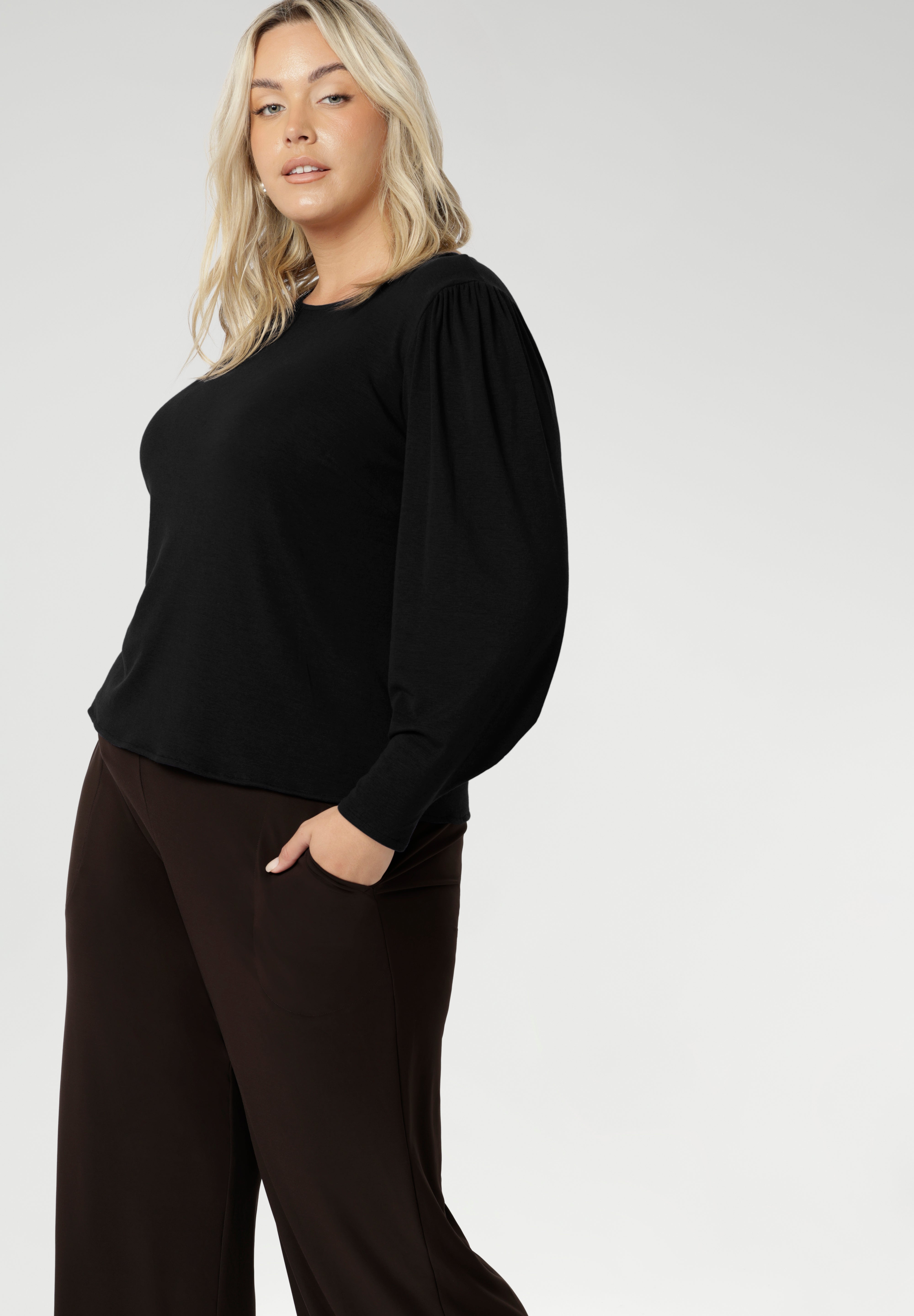 The ultimate knit top for effortless layering through the cooler months. Designed with a modern, feminine cut, it features a boat neckline and full-length bellow sleeves with soft gathers at the shoulders.