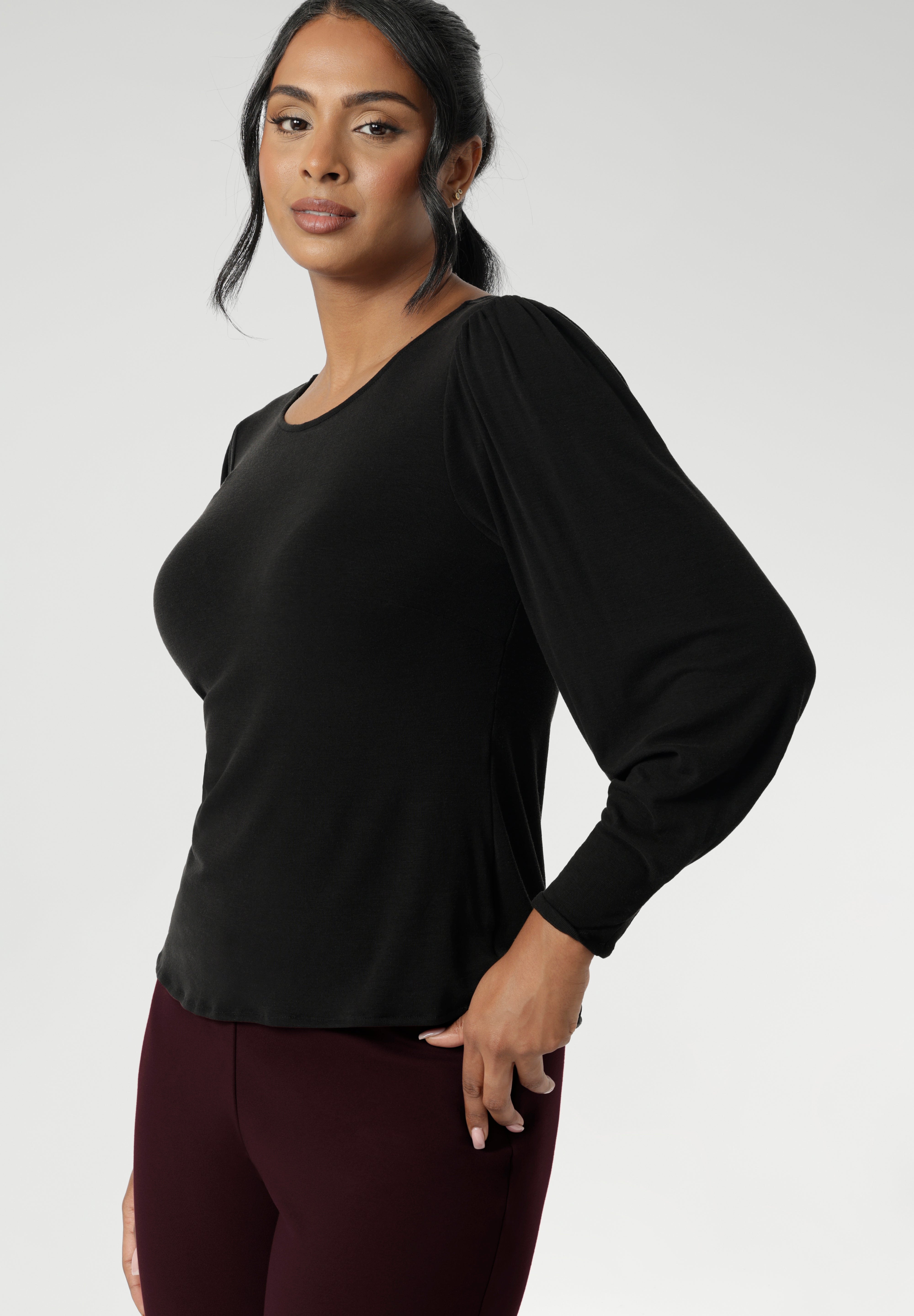The Zara knit top, a refined yet relaxed essential designed for cool-weather layering. With its modern silhouette and graceful bellow sleeves, this piece delivers understated elegance and all-day comfort. Available in size 8-24