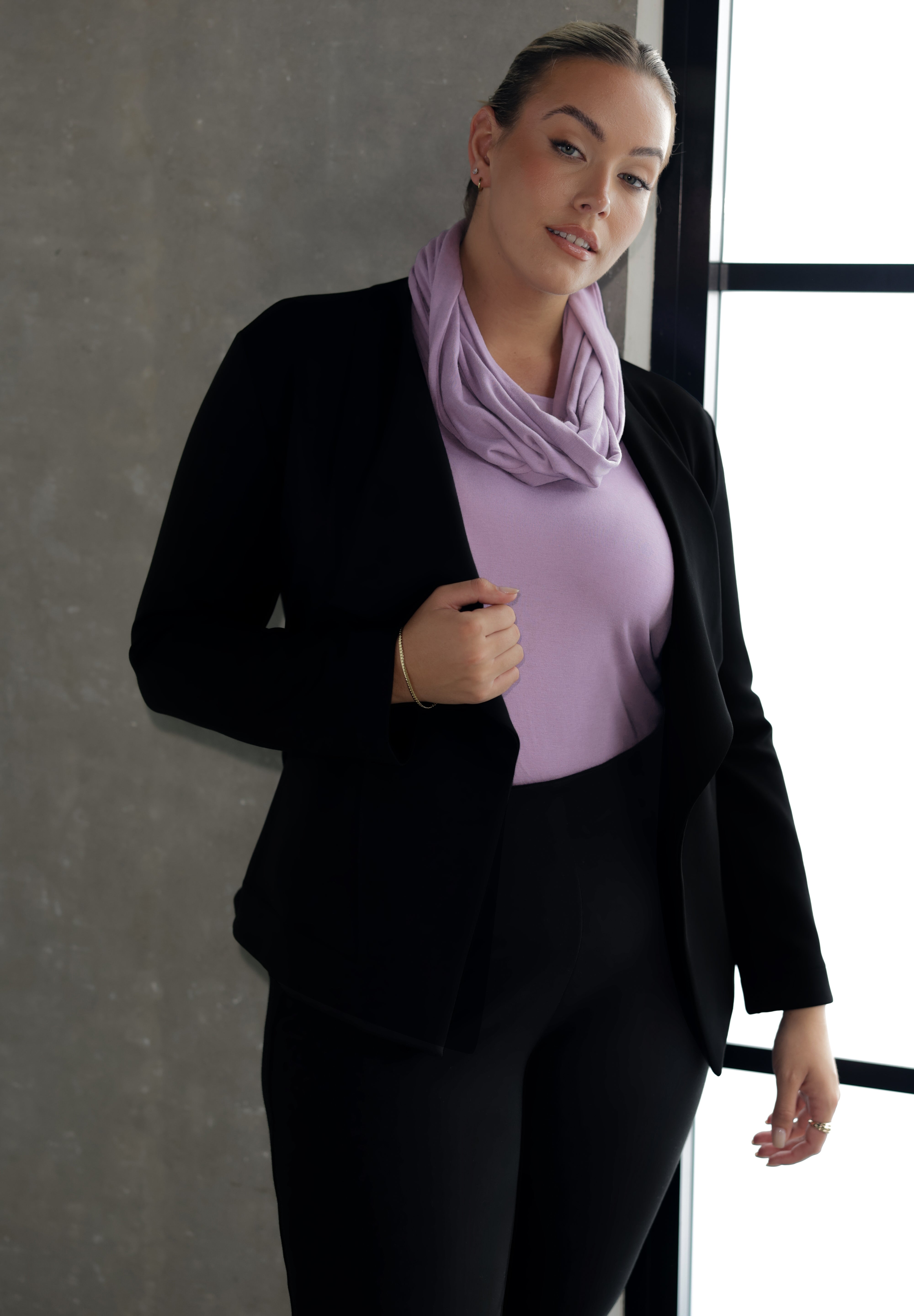 The Infinity Knit Scarf is the ultimate blend of luxury and practicality, crafted for effortless layering through autumn and winter. Made in Australia from a beautifully soft Tencel wool blend. Match back Lyndon Jacket in Black for warm corporate look for the cooler months.