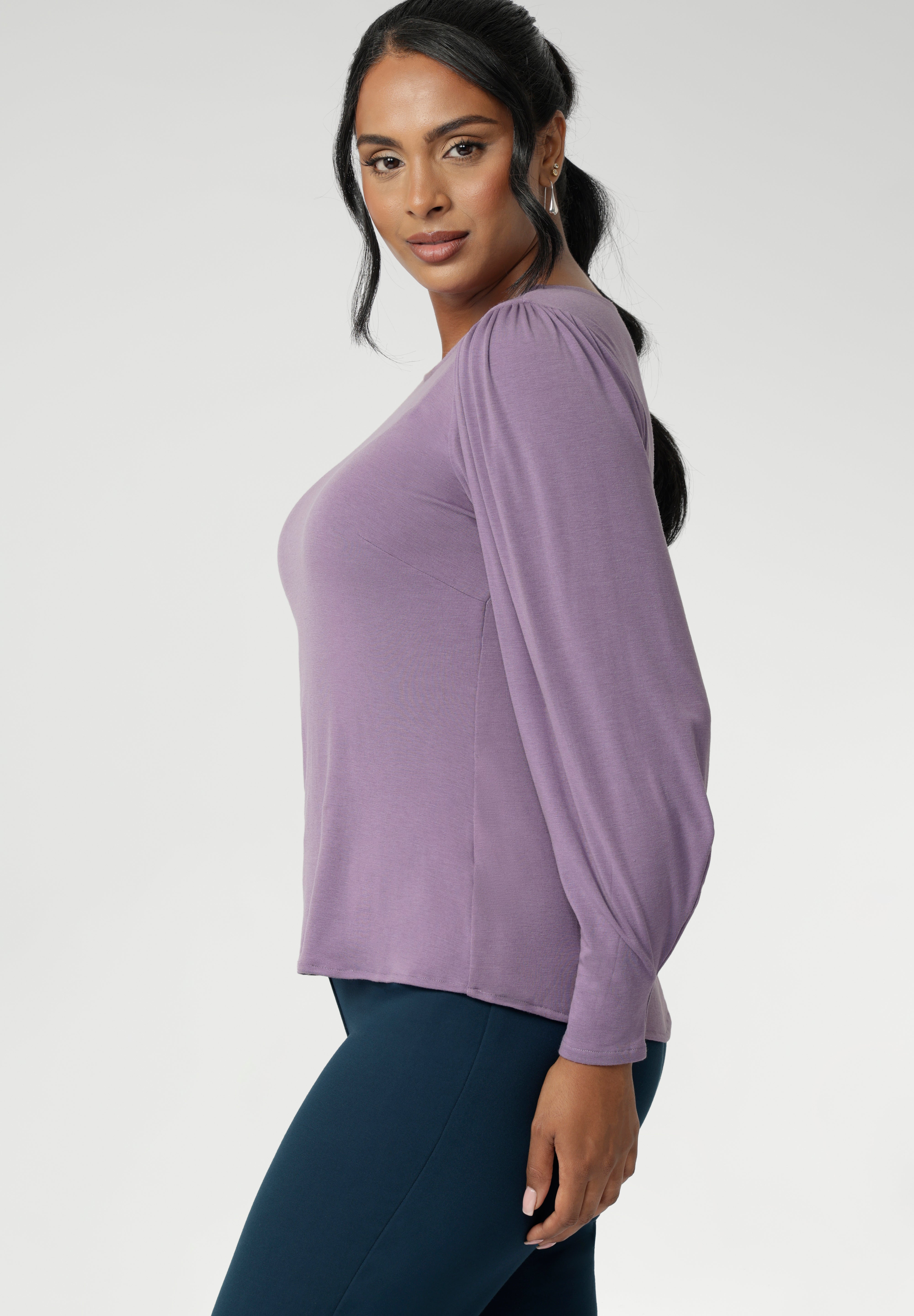 The tailored bust darts and close-to-body silhouette offer a sleek yet relaxed fit, while the straight front hem and gently curved longer back hem add a modern finish. This soothing lilac hue adds a touch of colour to grey days, pairing effortlessly with LF Garcia jackets or the timeless Sorel Trenchcoat. Made in Australia and available in sizes 8 to 24, the Zara top is a must-have for women in Australia and New Zealand who want easy layering with a sophisticated edge.