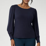 The Zara Top in Navy creates subtle shaping through the body and bust darts create a flattering, close-to-body fit that moves easily from work to weekend. The hemline is thoughtfully finished with a straight front and a slightly longer curved back for extra coverage and a polished touch.