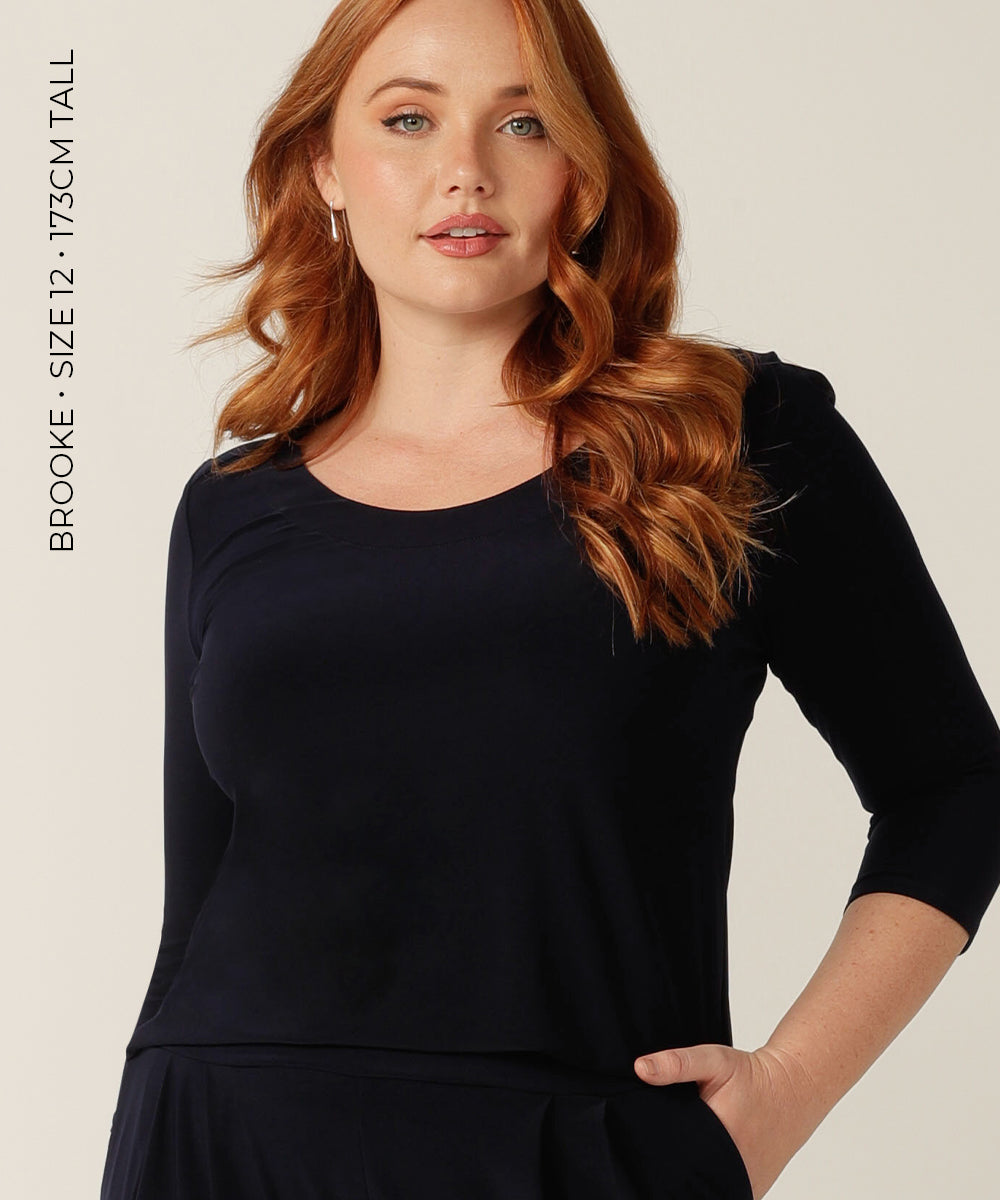 tailored top with round neckline and 3/4 length sleeves