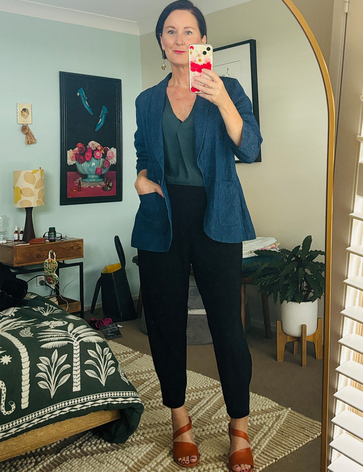 Founder of eco-conscious fashion label, Leina & Fleur wears cotton hemp sutainable blazer in vintage denim, pull-on shirt in green Tencel and tapered leg off duty pants