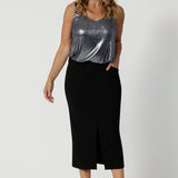 Great for over 40s women's style, 
this straight-cut black midi skirt in lightweight scuba crepe jersey is ,ade in Australia by Australian and New Zealand women's clothing brand, Leina & Fleur, this stretchy, easy-care skirt is a perfect workwear suit or off-duty styling.