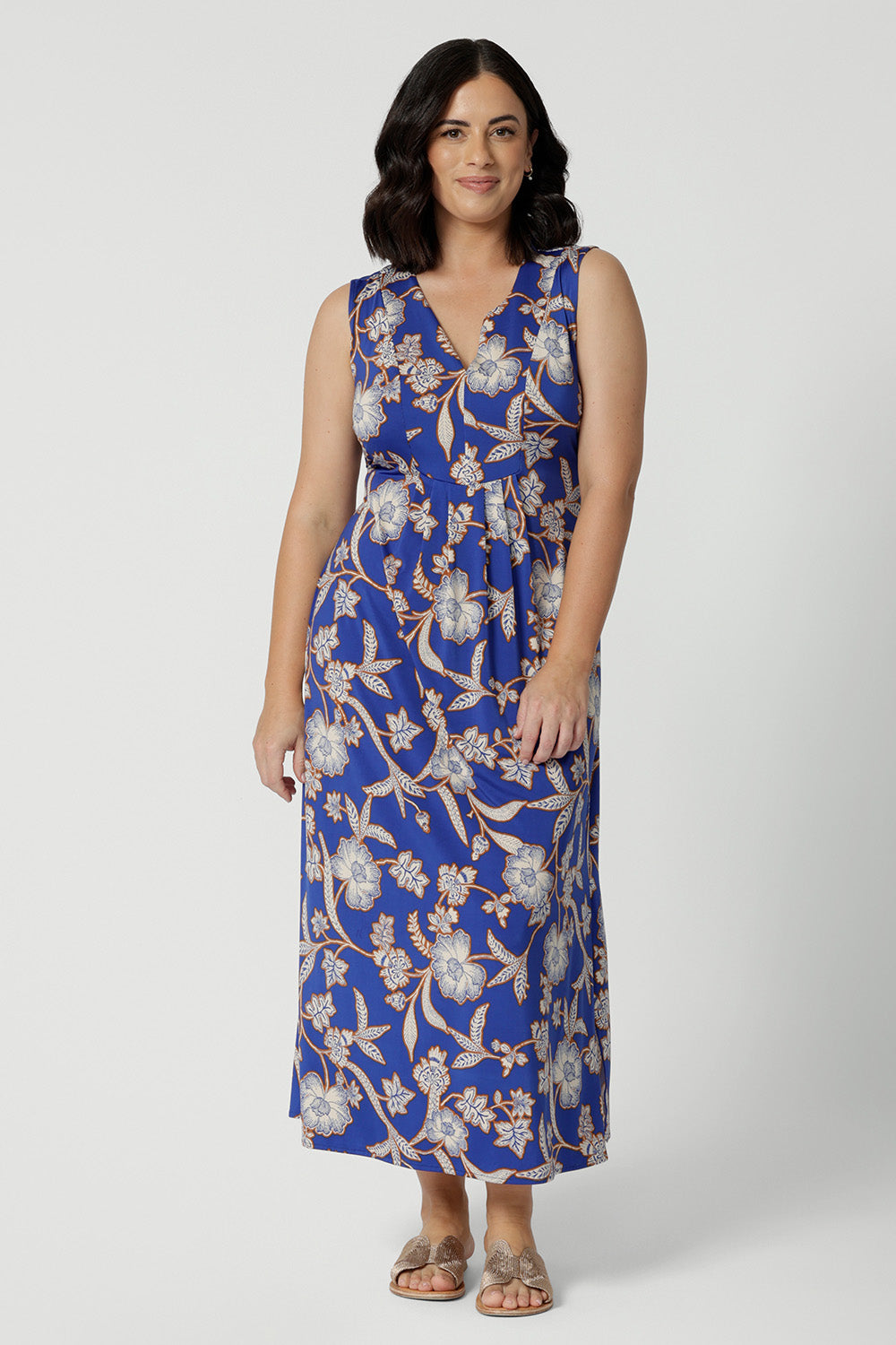 Petite sleeveless floral print dress in slinky jersey fabric, designed by Australian and New Zealand women's clothing brand, Leina & Fleur. This midi-length summer dress features an empire line cut for a flattering fit, available in petite sizes.