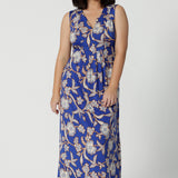 Petite sleeveless floral print dress in slinky jersey fabric, designed by Australian and New Zealand women's clothing brand, Leina & Fleur. This midi-length summer dress features an empire line cut for a flattering fit, available in petite sizes.