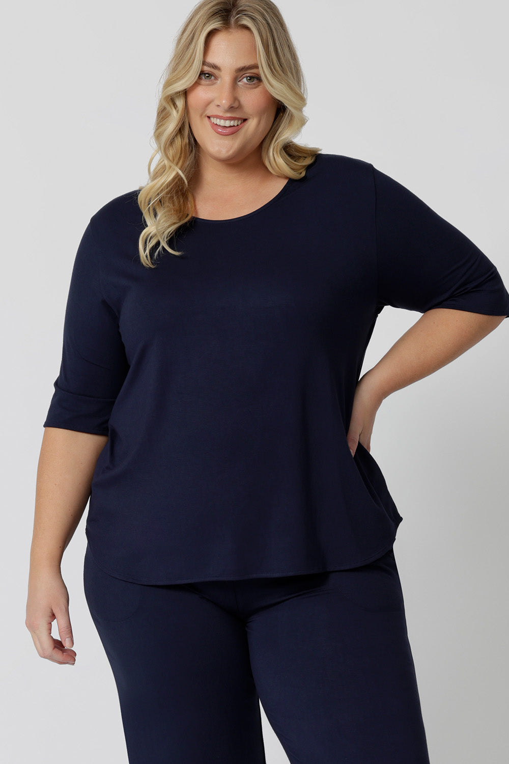 This navy blue tee top with 3/4 sleeves looks great as plus size sleepwear. Worn by a size 18 woman, this curve top makes for a comfortable pyjama top and being breathable and thermo-regulating, it's a great top for night sweats and hot flushes. 